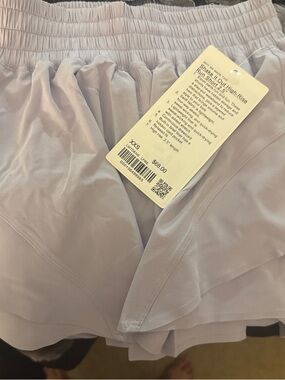 2.5 in shake it out hotty hot

Lululemon Light Lavender Shorts
Size XXS